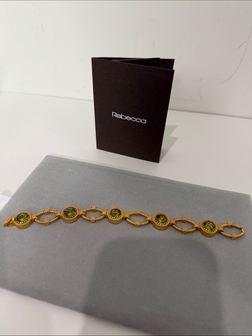 BECCA Gold-Tone Bracelet with Green Stones and Textured Links